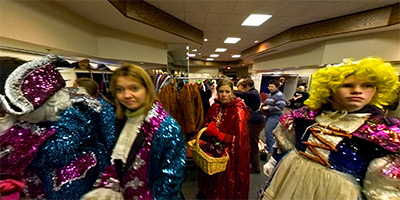 Costume change after the Holidazzle Parade.