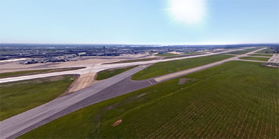 Aerial panorama of New Orleans Louis Armstrong International Airport.