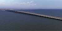 Aerial panorama of the I-10 Twin Spans on Lake Pontcartrain after Katrina.